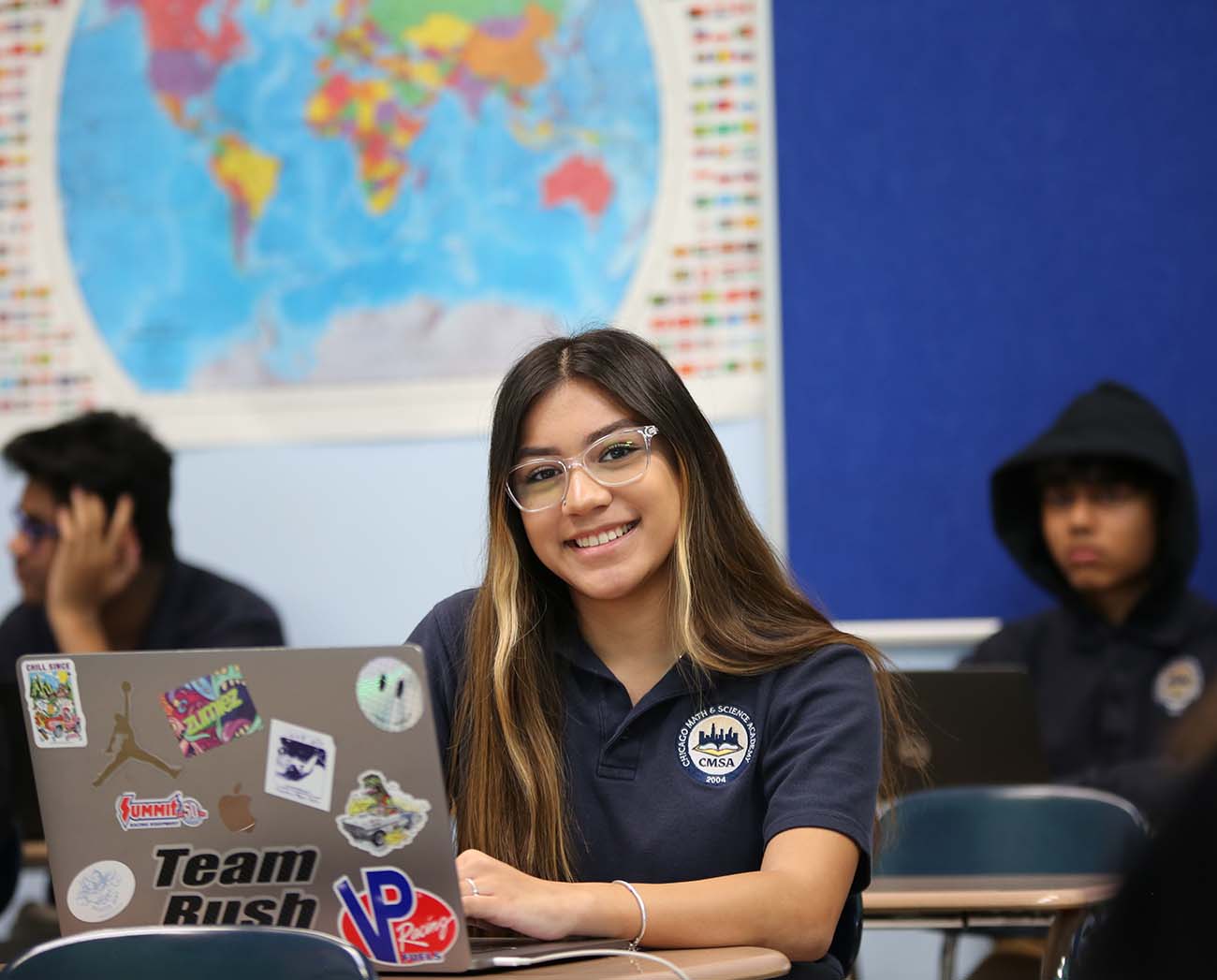 Smiling children together outdoors.